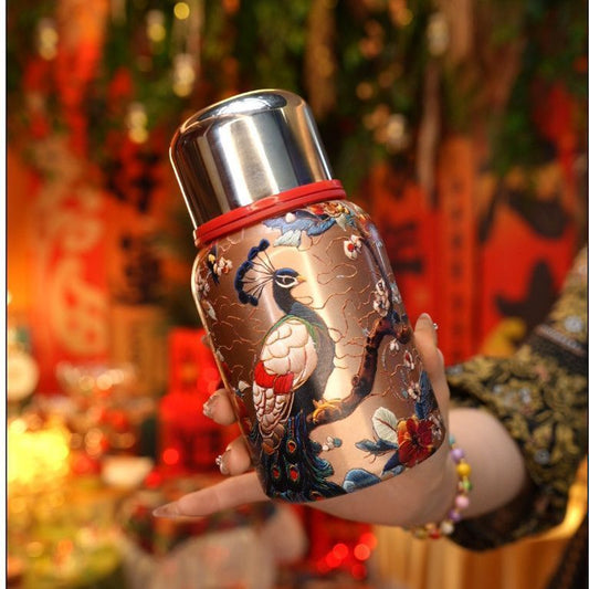 🔥Outdoor portable pocket royal peacock bottle