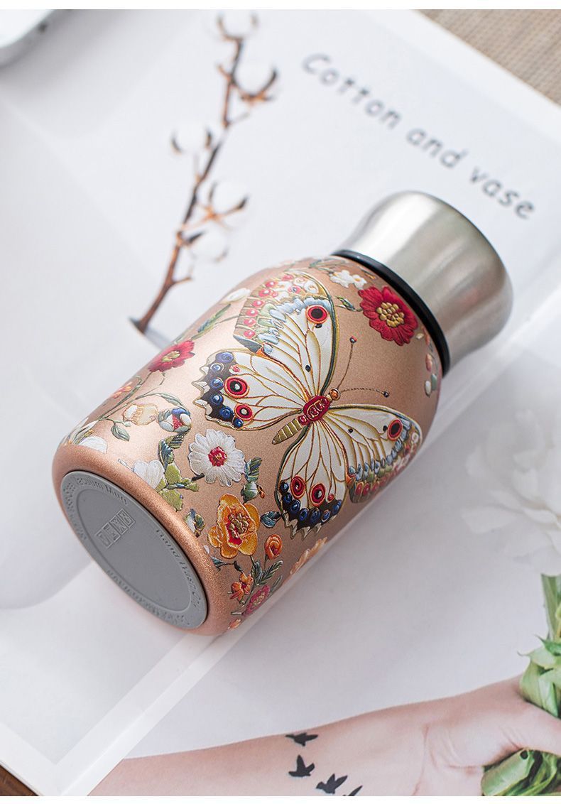 🔥Outdoor portable pocket royal peacock bottle