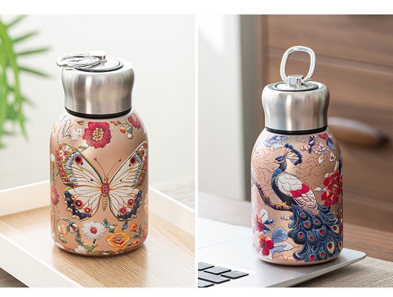 🔥Outdoor portable pocket royal peacock bottle