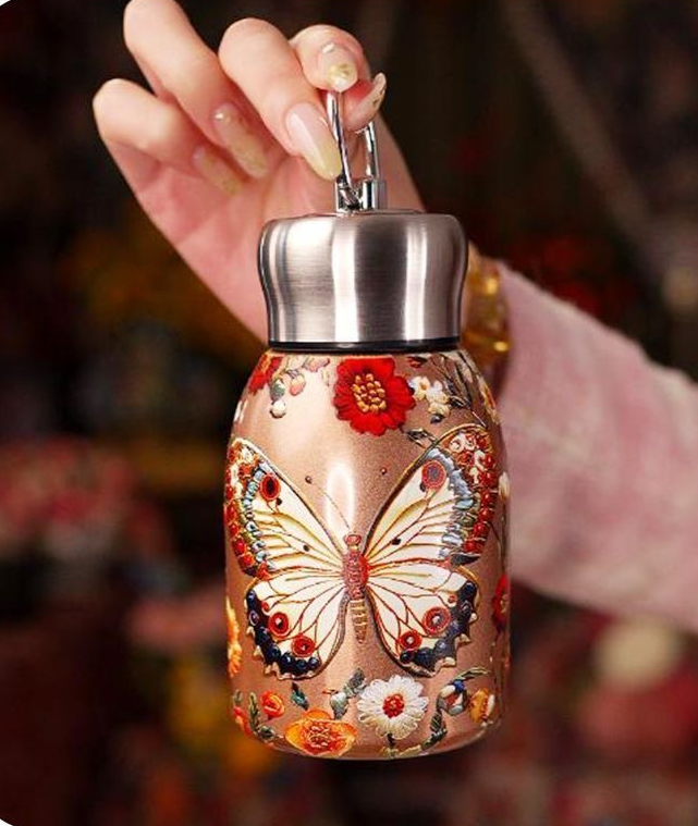 🔥Outdoor portable pocket royal peacock bottle